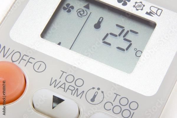 Obraz Set temperature at 25 degree on remote control air condition