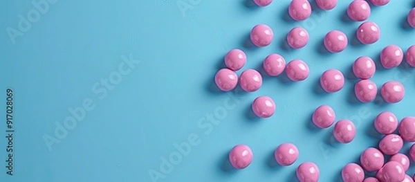 Obraz Blue background with copy space image features chewing gum