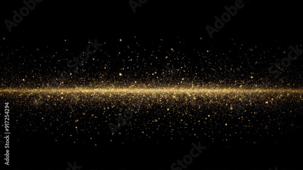 Fototapeta Golden particles falling from above, creating a sparkling and luxurious atmosphere on a dark background. Ideal for festive, celebratory, or luxury-themed designs and creative projects.