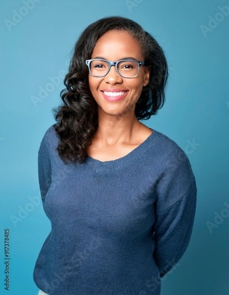 Obraz A woman wearing glasses and a smile on her face