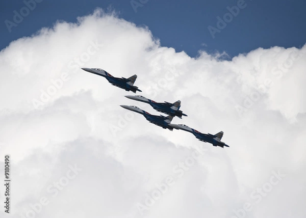 Fototapeta the four of yhe russian fighters in the flight