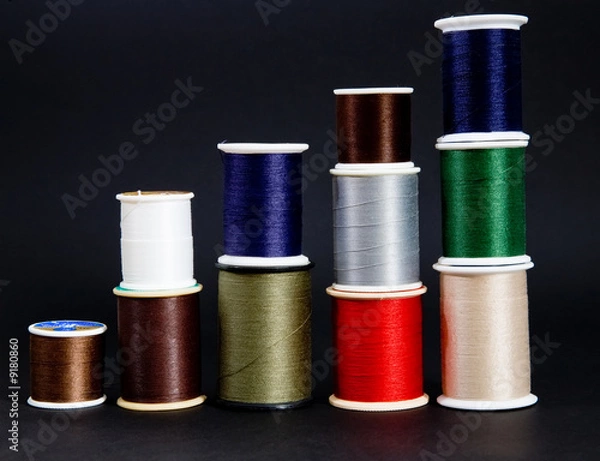 Obraz Five stacks of multi-color thread