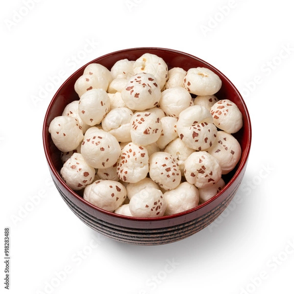 Fototapeta Bowl with puffed Lotus seed isolated on white background close up