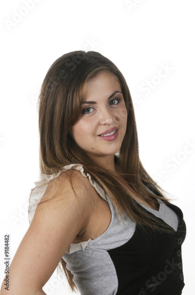 Fototapeta pretty hispanic model looking over shoulder isolated on white