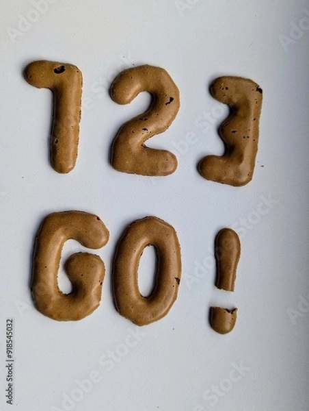 Fototapeta Worte und buchstaben aus karamell keksen 1. 2. 3. Go!