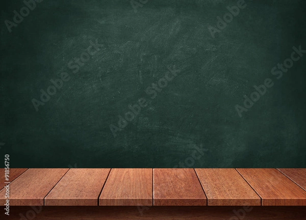 Obraz Wood table with blackboard background