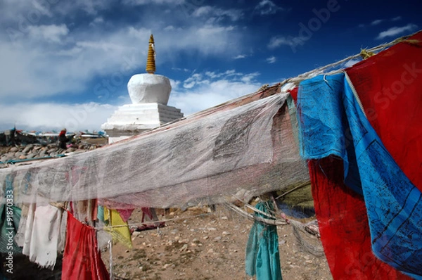 Obraz Prayer flags and buddhist stupa in the small village of Hor i Western Tibet