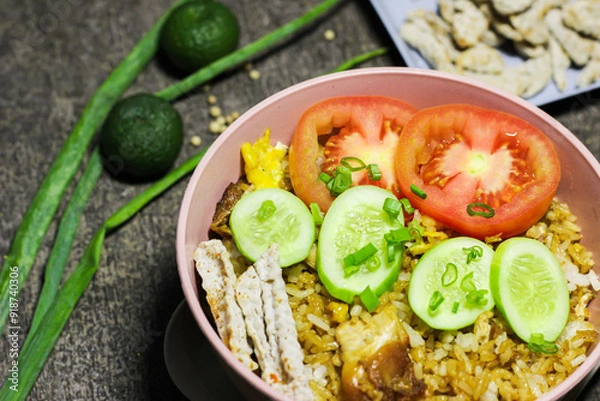 Obraz Fried rice or Nasi goreng, traditional frying rice dish from indonesia made of Precooked rice fried in a small amount of oil
