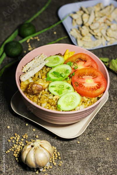 Obraz Fried rice or Nasi goreng, traditional frying rice dish from indonesia made of Precooked rice fried in a small amount of oil