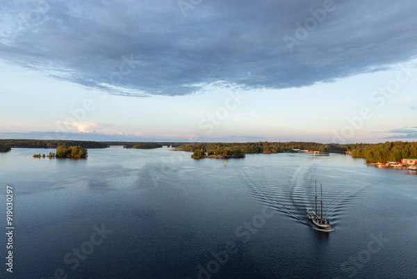 Fototapeta Sailing boat at sunset, Saimaa Lake in Finland