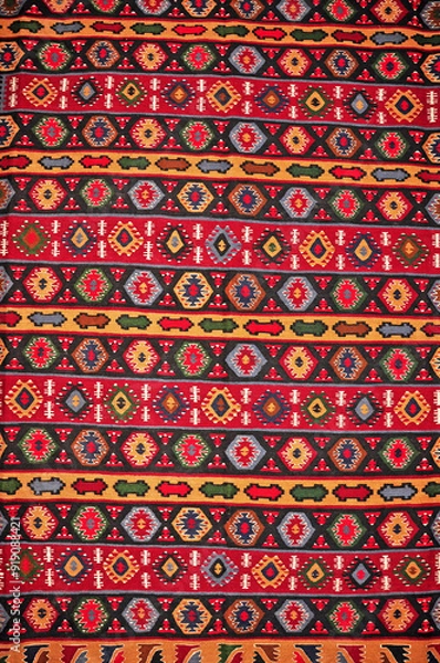 Fototapeta Segment of handmade carpets in bright colors