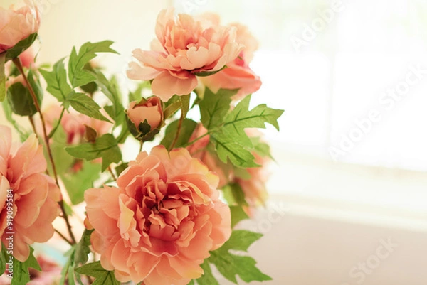 Fototapeta bouquet of fabric old rose color flower in vintage style with copy space , selective focus