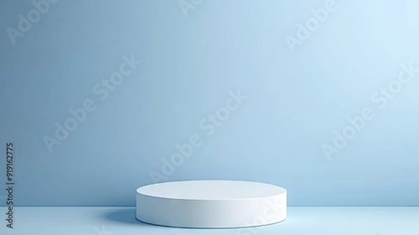 Obraz A round pedestal with a solid light blue background, ideal for clean and fresh product displays.