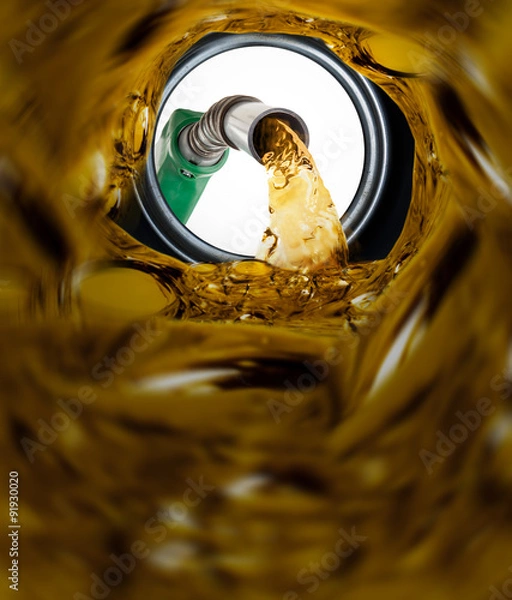 Fototapeta Refilling fuel view from inside of gas tank of a car