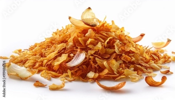 Fototapeta Crispy fried onion flakes isolated on white background. Crunchy Scattered Dry Onion Pieces close up