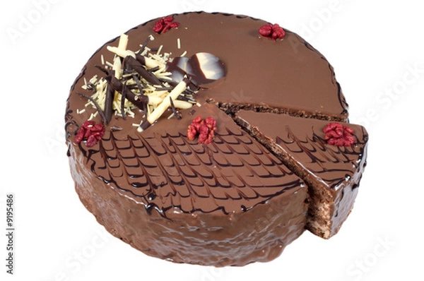 Obraz Cut birthday cake with walnuts and decoration on white