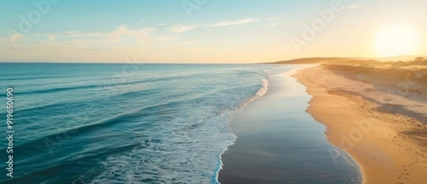 Obraz Beach with incoming waves and sunrise over ocean