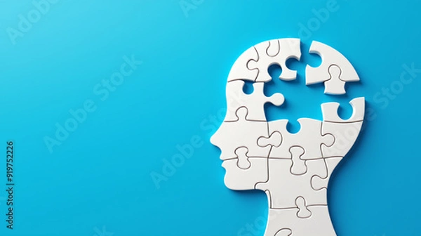 Obraz Head as a puzzle with missing puzzle pieces on blue background