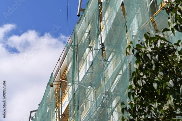 Fototapeta Insulating and repair works on the appartment house. Improving energy efficiency. Selective focus. 