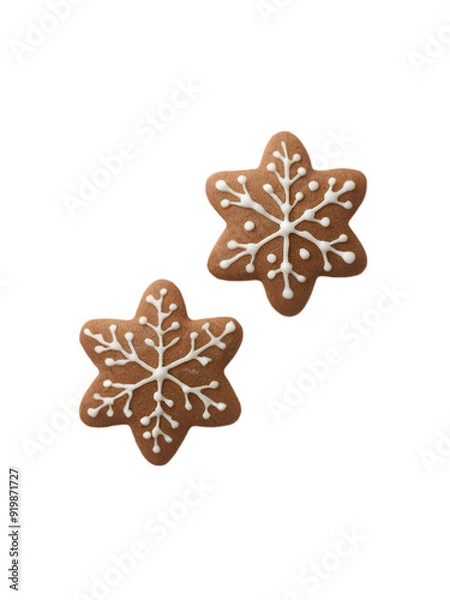 Fototapeta Gingerbread Snowflake Sparkle: Two intricately iced gingerbread cookies in a classic snowflake design, evoking warmth and holiday cheer. 