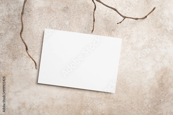 Fototapeta Blank invitation, flyer or greeting card mockup on beige background, copy space, top view