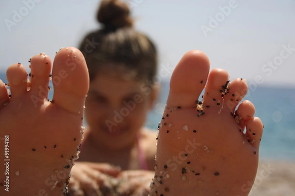 Obraz jugando en la playa