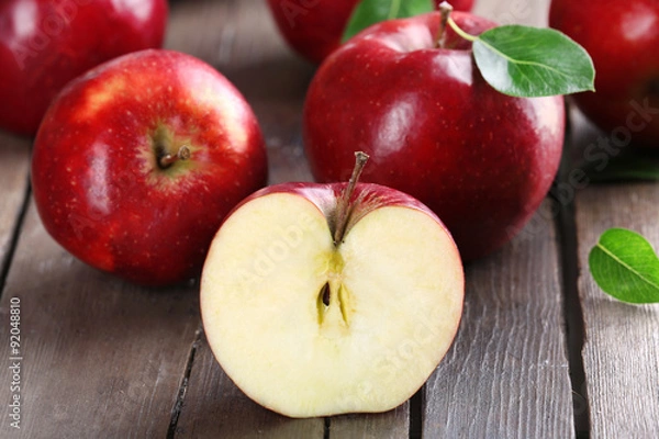 Fototapeta Ripe red apples on table close up
