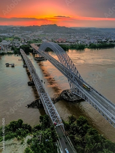 Fototapeta a Mahakam bridge in sunset day in samarinda