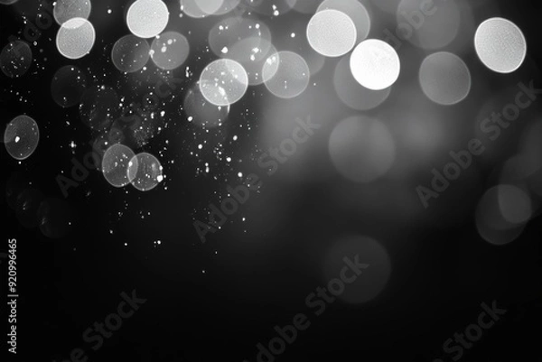 Obraz Blurred silver bokeh on black background