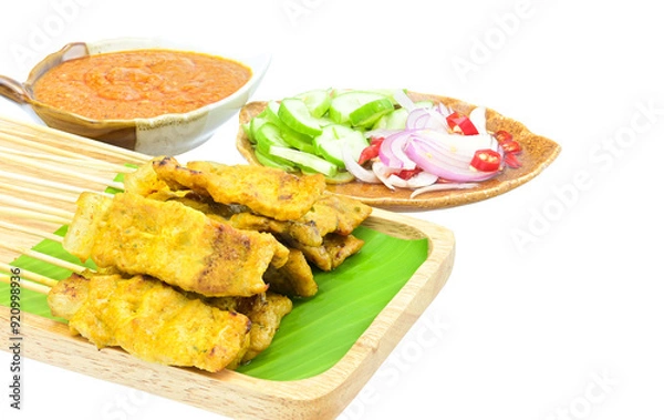 Fototapeta Pork Satay with Peanut Sauce and pickles which are cucumber slices and onions in vinegar on white background,isolated
