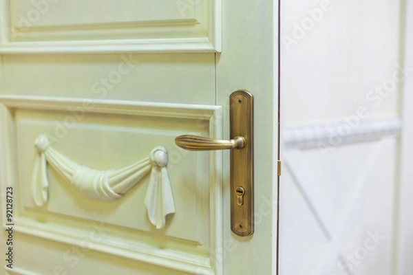 Obraz door handle in white interior