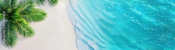 Fototapeta A serene beach view featuring crystal clear water and vibrant palm leaves, perfect for relaxation and tropical vibes.