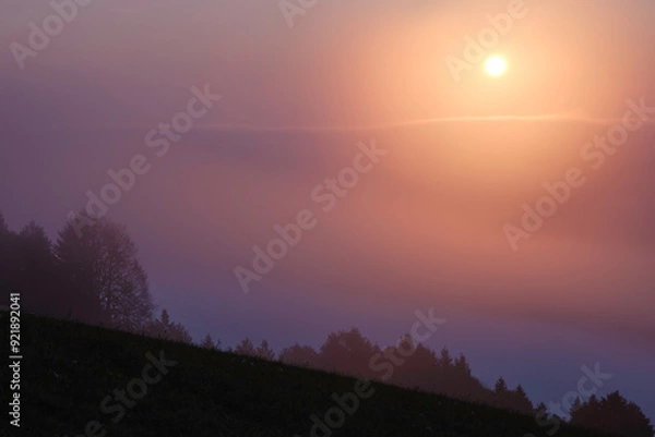 Obraz sunrise from behind the clouds