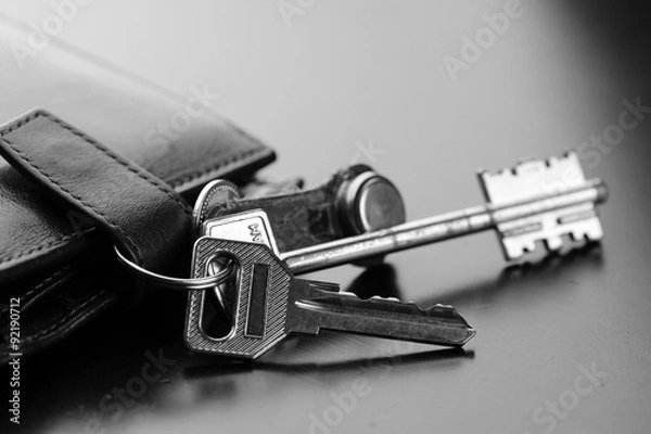 Fototapeta Wallet keys table