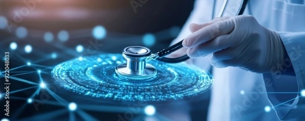 Fototapeta Doctor holding a stethoscope over a digital network.