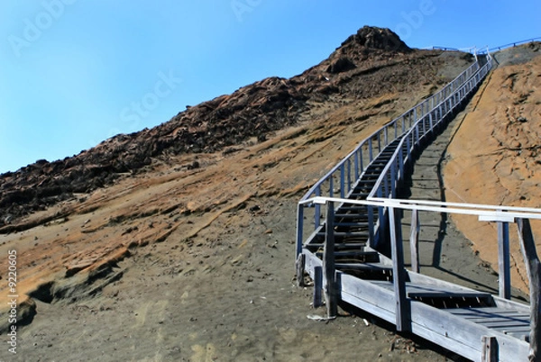 Obraz Wooden stairs lead to the top of a mountain