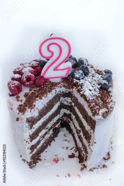 Fototapeta chocolate cake on a white background for a two year old