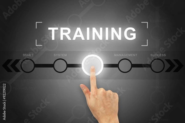 Fototapeta hand clicking training button on a screen interface