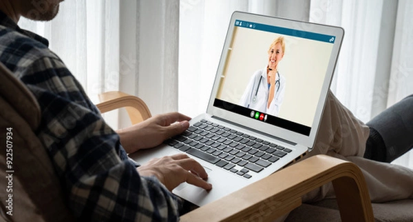 Fototapeta Doctor video call online by modish telemedicine software application for virtual meeting with patient