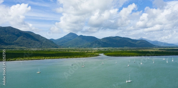 Fototapeta Aerial view of mangrove forest inlet and mountain range, Cairns, Queensland, Australia