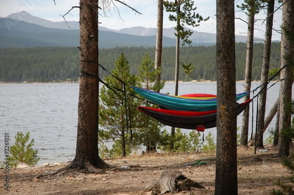 Fototapeta hammock at lake in mountains