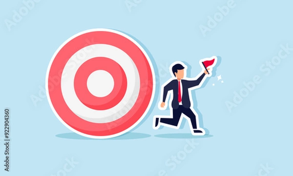 Fototapeta Chasing company work targets to achieve goals and earn recognition concept of A businessman running with a flag while being chased by a target board