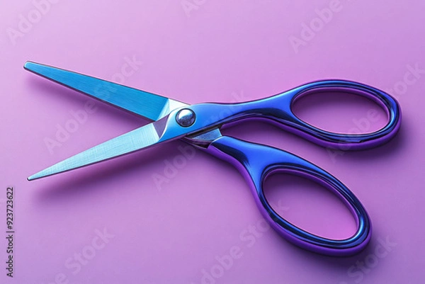 Fototapeta A pair of scissors and a glue stick arranged on a pastel lavender background, ready for an art project,