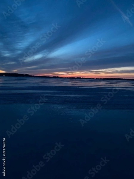 Obraz sunset over a frozen lake