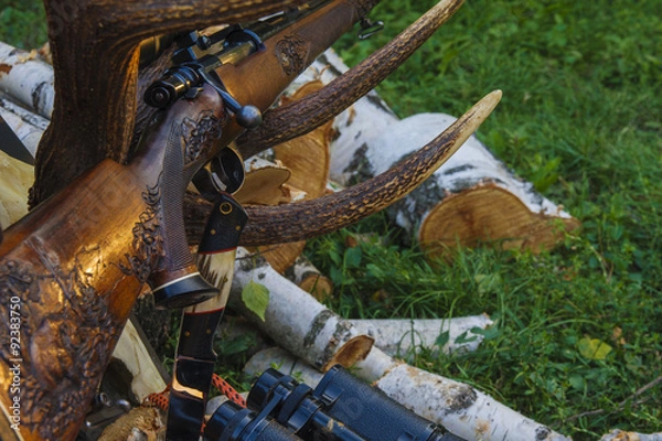 Obraz Rifle with hunting knife and binocular