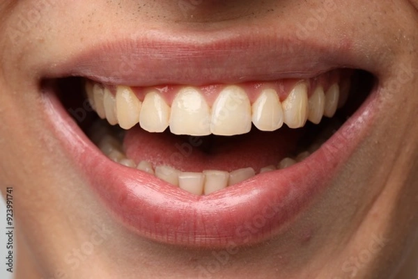 Obraz Smiling man with healthy clean teeth, closeup