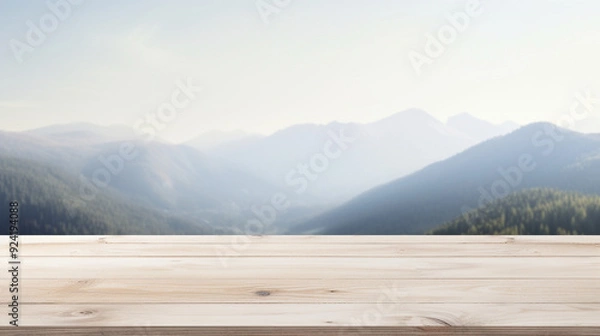 Fototapeta empty wooden table overlooking a scenic view of mountains 
