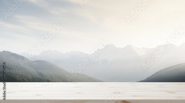 Fototapeta empty wooden table overlooking a scenic view of mountains 