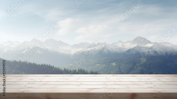 Fototapeta empty wooden table overlooking a scenic view of mountains 