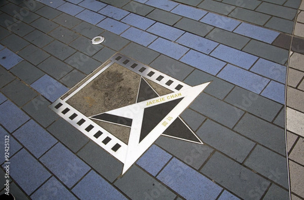 Obraz Слепок и роспись Джеки Чана на Аллее Звёзд Гонконга